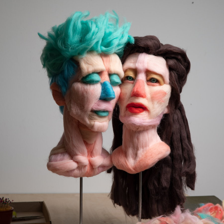 Sad-looking couple of 3D wool busts by artist Salman Khoshroo.