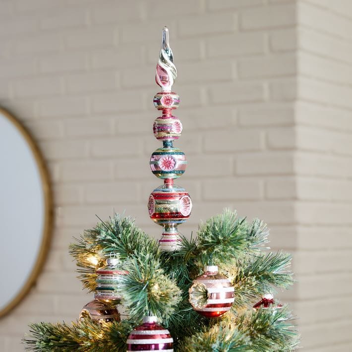 Exquisite shiny tree topper featured in West Elm's 2020 holiday decor collection.