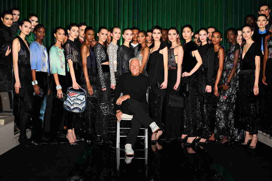 Giorgio Armani stands with the models featured in his show at  Milan Fashion Week 2022. 
