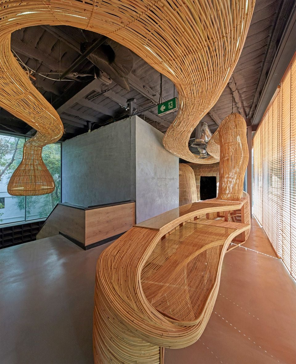 Enter Projects previously designed Vikasa Yoga Studio, whose interiors make similar use of organic rattan.
