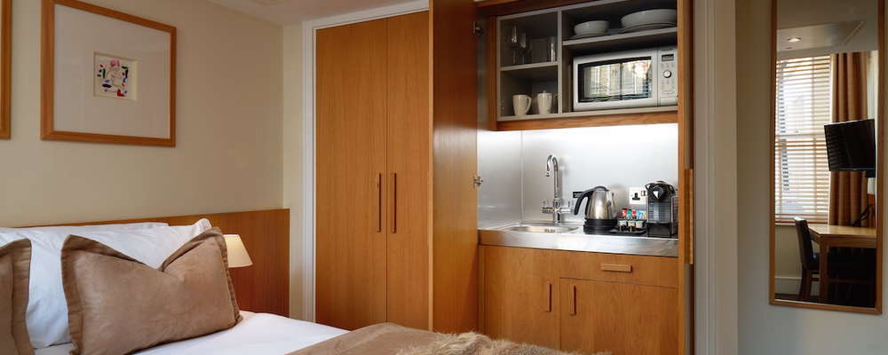 Standard Double room, with view of the in-room mini kitchen