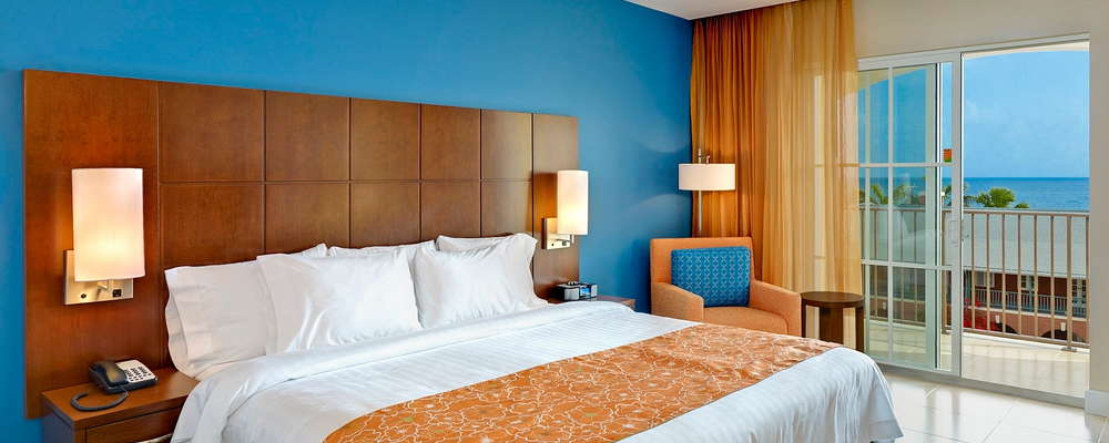 Contemporary styling surrounds our king guest room with a clean and crisp look and feel.