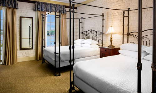 River View with Two Queen Beds, Carpet, Exposed Brick Walls