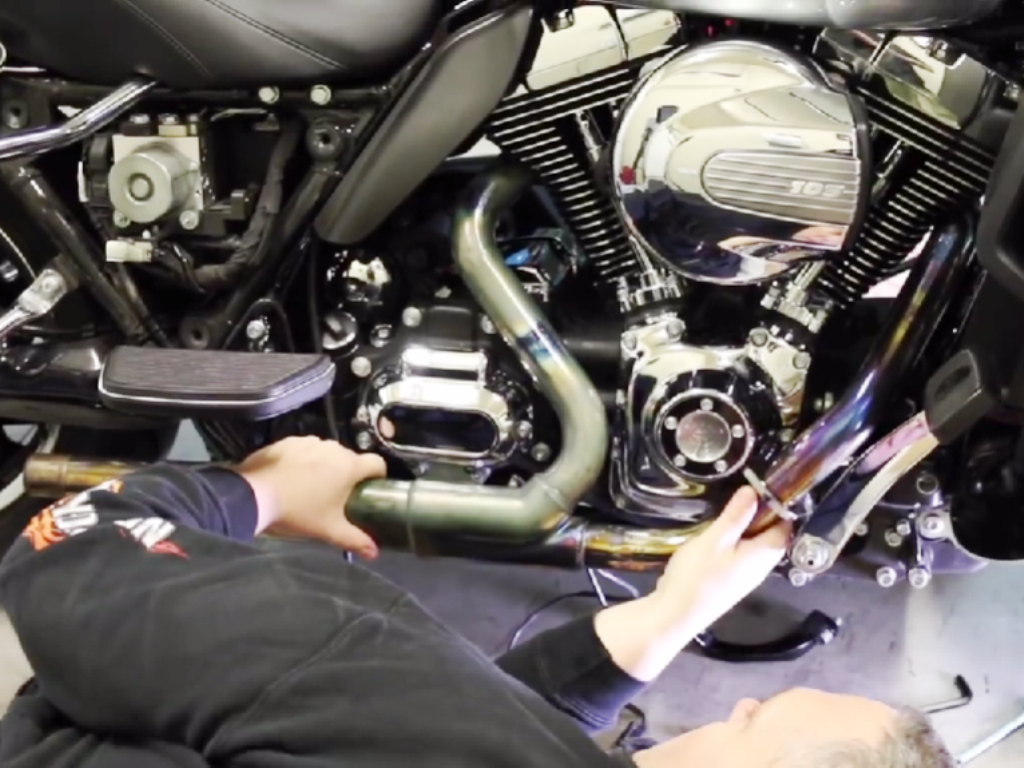 Removing head pipe from motorcycle