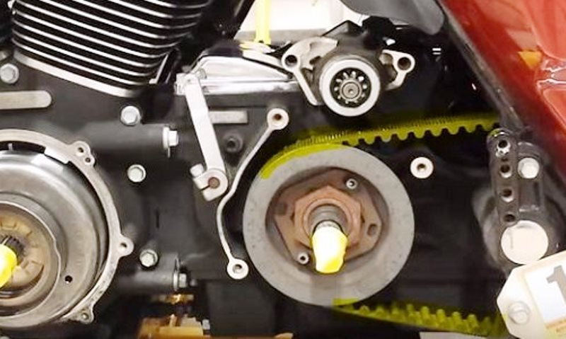With the inner primary cover off, you now have access to the belt, but you still need to remove the rear wheel and swing arm
