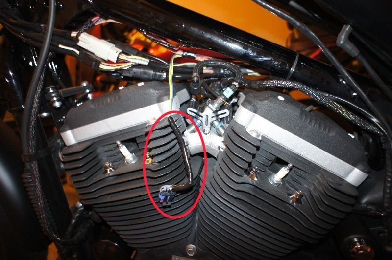 Relocating and wrapping the ignition coil wire