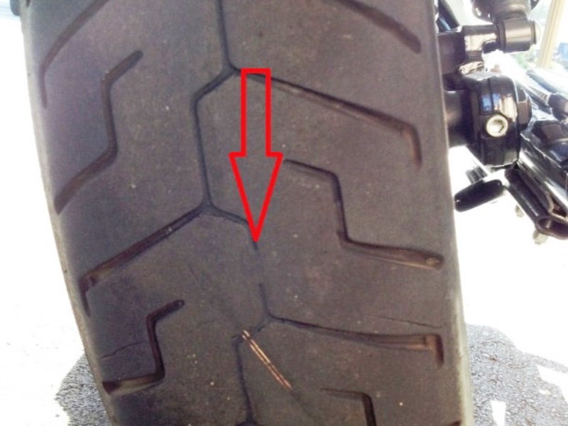 Tire worn to wear bar