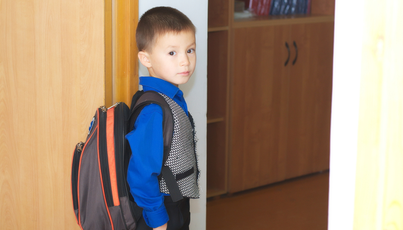 boy wearing backpack