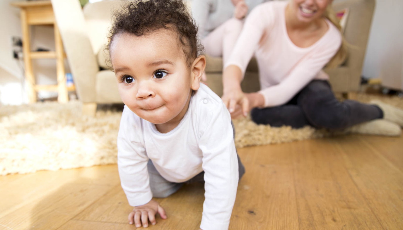cute baby crawling on the floor