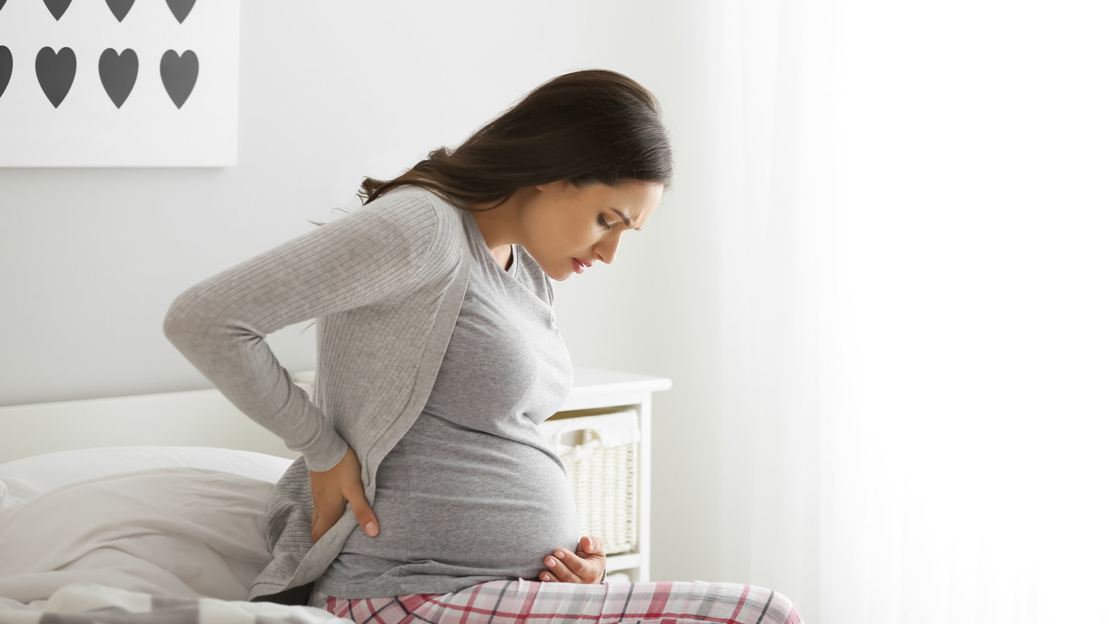 pregnant mom having back pain