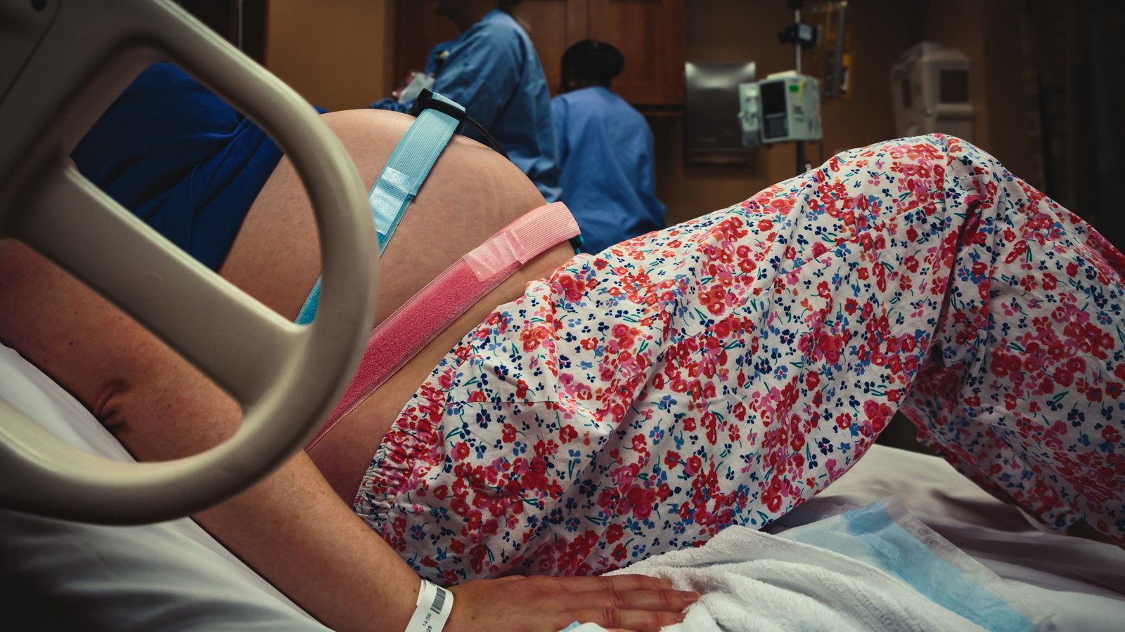 pregnant woman in labor being monitored with belts