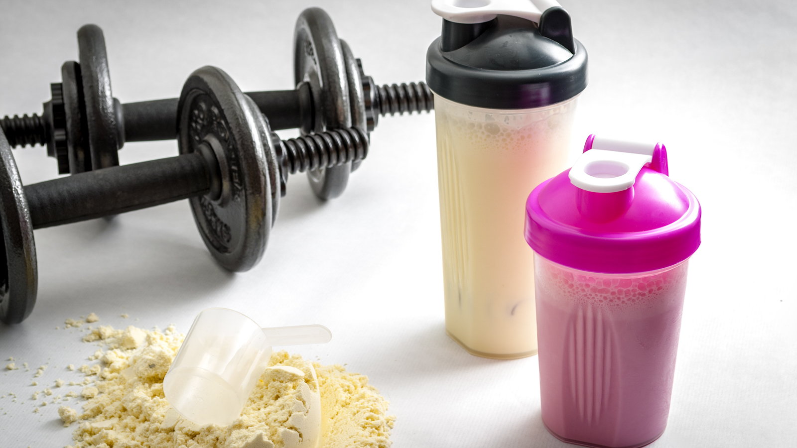 adjustable dumbbells and protein shakes