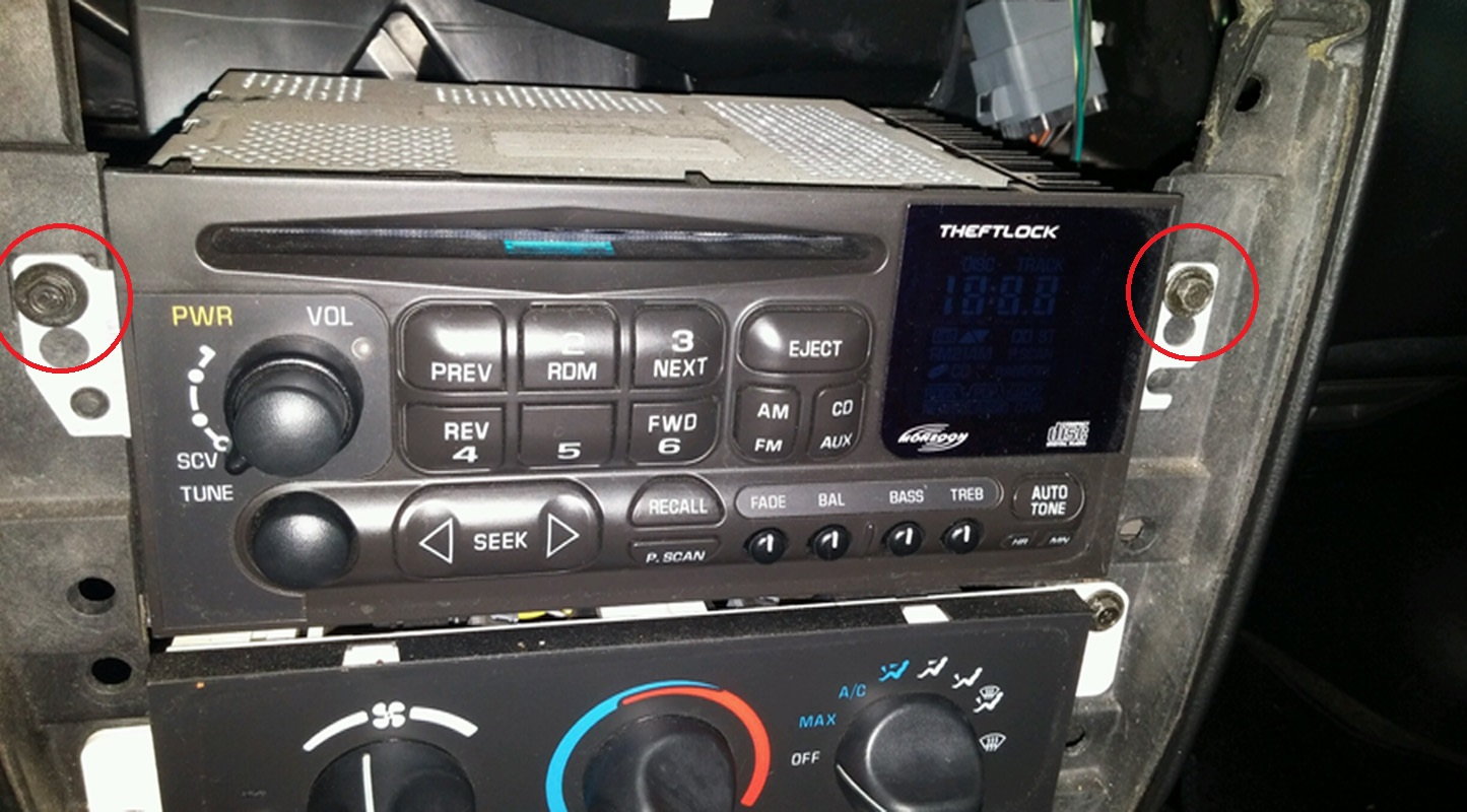 Bolts hold the radio in place