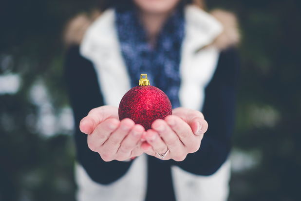 recovering addict holding a Christmas ornament