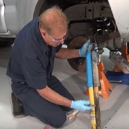 toyota tacoma strut shock replacement suspension DIY how to