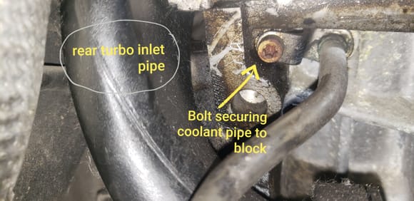 This is the location of the bolt for the coolant line where it is secured to the block.