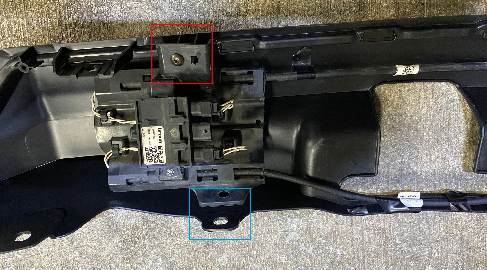 This is a close up of the HFS module mounted to the new trim panel. You can see its only connected by one screw (red section) and Ill probably put a plastic zip-tie for the (blue section) just for a little extra support.