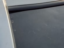 Peeling windshield trim. Could this be the problem? 