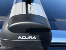 Acura OEM crossbars with removable rubber strip. 