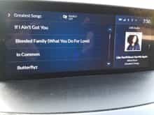 Infotainment view , open by Albums,  It will play by track , non Alphabetically