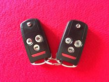 2 OEM Acura key fobs.  Ke fob #2 never used.