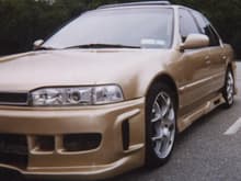 1990 Honda Accord (2002) with custom champagne/gold pearl paint &amp; black widow body kit.