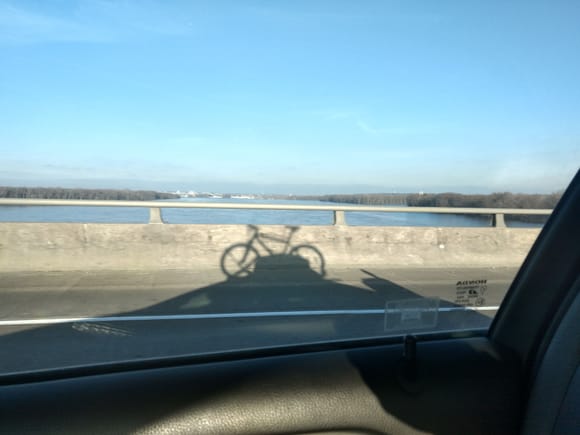 Crossing the Mississippi river; keeping my eyes on the road and just randomly taking a few pictures without knowing what the camera was seeing.