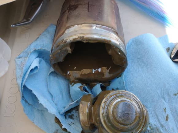 CV Joint, old grease is brown. 