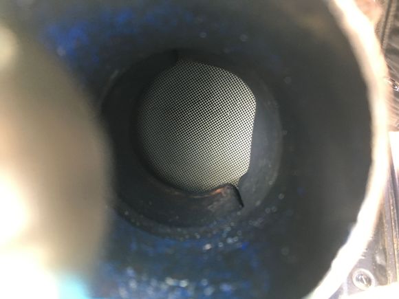 For those who debate on wether to put premium or regular in our TL's, this is what the outlet of my cat looks like after 19 years and 261k of nothing but premium fuel. 
Even the original O2 Sensors were in perfect condition we couldn't believe it so I wound up re-using the old O2 Sensors.