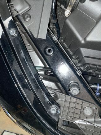 Zoom in ,there is a notched metal wheel that you have to turn with a philip screwdriver 