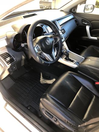 The leather on the driver's side seat has actually held up quite nicely. The interior is a 9/10. The previous owner used WeatherTech floor liners, which helped immensely. 