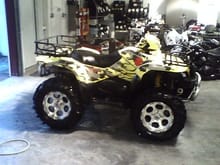 guys bike when i worked at bike shop, he loaded this kingquad full of things,graphics,wheels,cams,elka's,fmf,skids,winch,Ipod gear and more lol                                                         