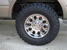 295x70x17 Toyo MT's on American Racing Crater wheels.