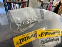 BTW, this is a simple Lexan plastic cover that bolts onto your rear wheel.  You actually ordered them to fit the inside diameter of the rim.  Mine is for a MA-40 with a freewheel so it doesn’t quite fit right in a tubular.  They were mostly marketed to TriGeeks 