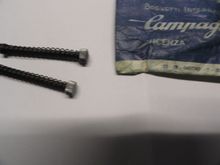 As they came from the original package.  Black oxide and nickel finish knurled ends.