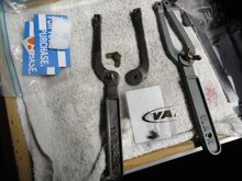 All the parts ready for reassembly.  A correct working tool is on the right.   Maybe some Rustoleum paint is next.