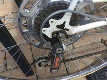 Shinny pie plate. Wing nut does not clear deraileur knuckle.
