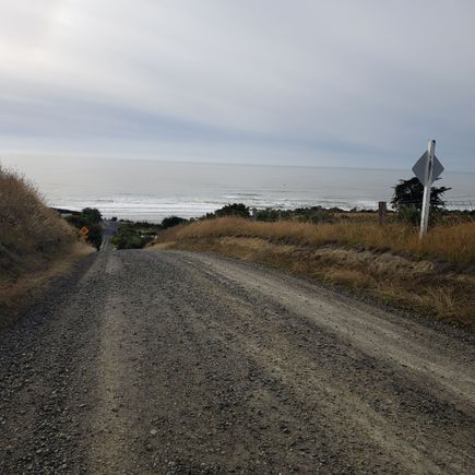 Up into the hills overlooking the sea.