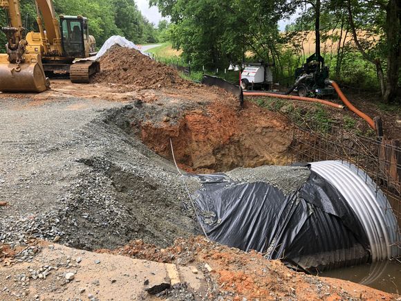 The old culvert got stopped up and washed out the road.