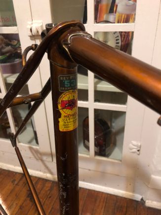 Plenty of patina, faded paint, and paint scrapes; still, no dents and the missing decals are replaceable. With proper care this can still be a nice looking frame.