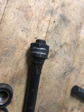 And some kinda split ring thingy in a channel on the spacer. 