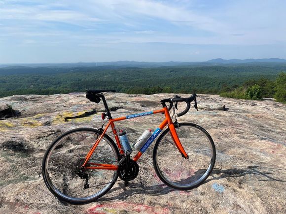 About 1/3 the way up at a rock slab with a nice view