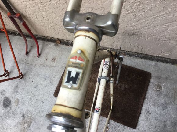 Bottom rivet is loose.