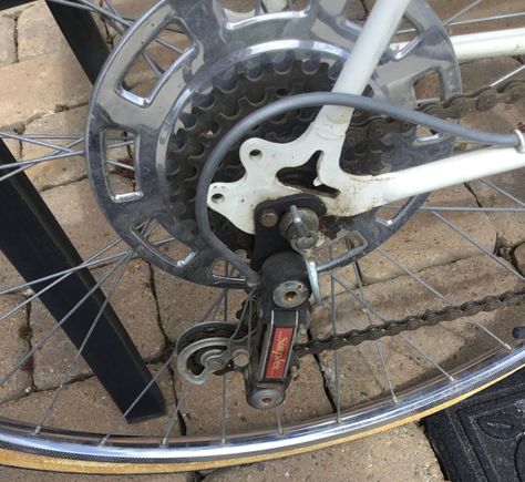 Shinny pie plate. Wing nut does not clear deraileur knuckle.