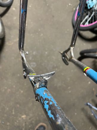 Say huh??
Is this a combo cable stop, cable guide, spoke catcher?