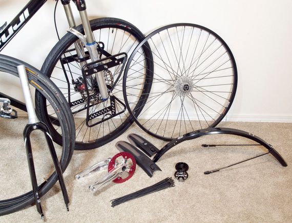The idea was to have two wheelsets, one with the 700x35 Nimbus Sport Blackbelts for dirt or gravel, one for the 700x32 Continental Sport Contact slicks. Easy changout. Original Fuji carbon blade fork is fun, too. 170mm crank on the bike, 175mm spare. 'DeFender' front fenders clip on. Street fenders are Portland Design Works. I like their mounting system. Spare front wheel had an accident before it was ever installed on the bike - waiting for a new matching rim to re-lace it.