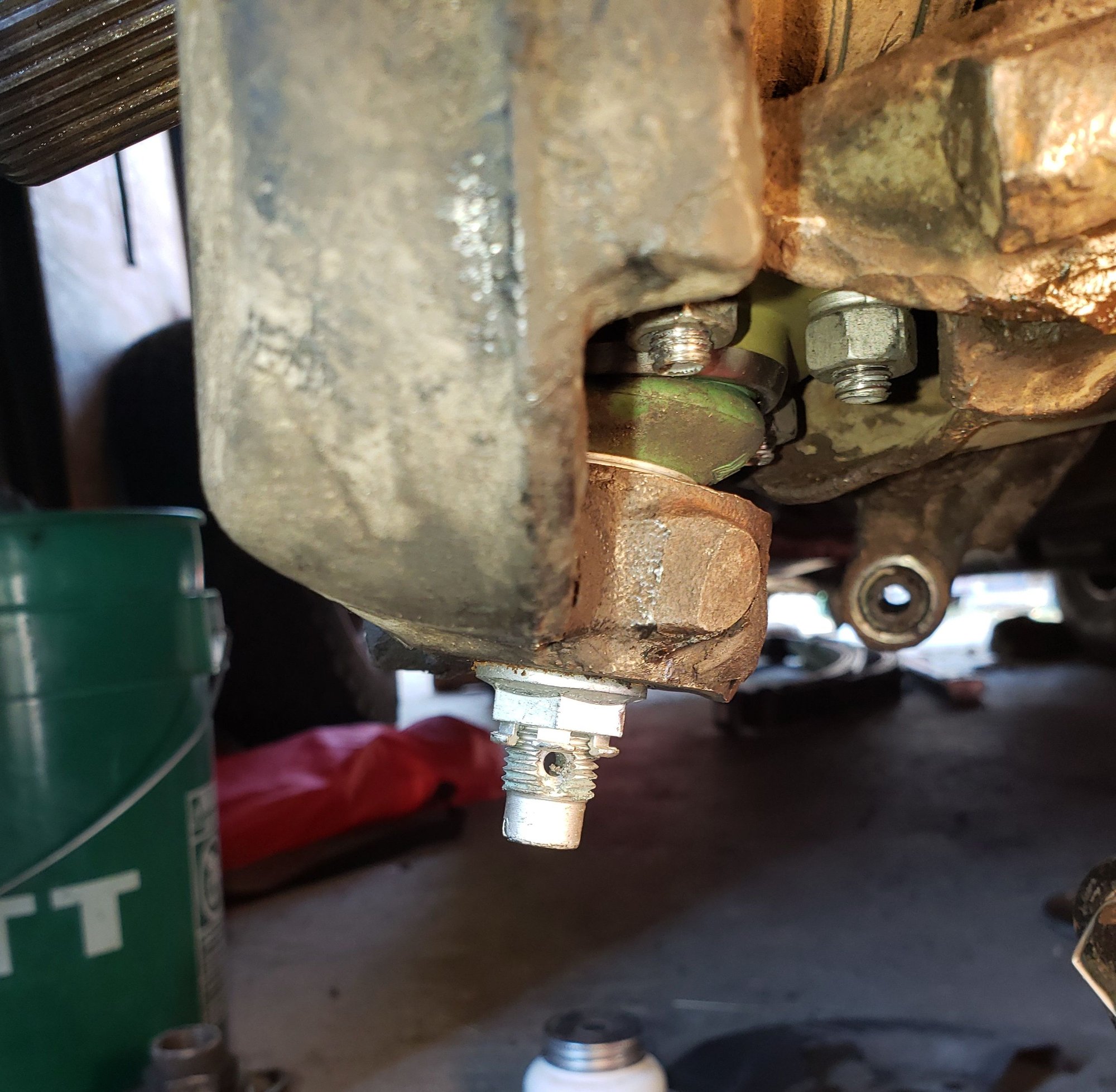 The installed new Mevotech ball joint with the cotter pin hole too high to engage the nut castellations.