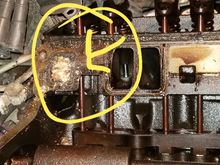 What the hell is this in this port right here some type of deposit carbon or is it from mixing some kind of antifreeze or did somebody put something in my system or what.