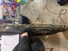 Have to cut the bottom of the bumper so it’s straight across the back like so it does involve cutting the one bolt hole pretty much off