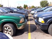 originally titled this one Bravadafly kisses, note the bald tires and saggy stance on the green one... also Tailgate is rusted halfway up LOL, I see them around town all the time haha.